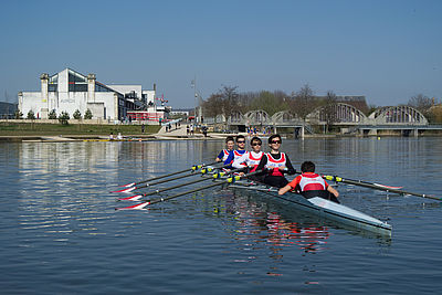 Young people practice rowing